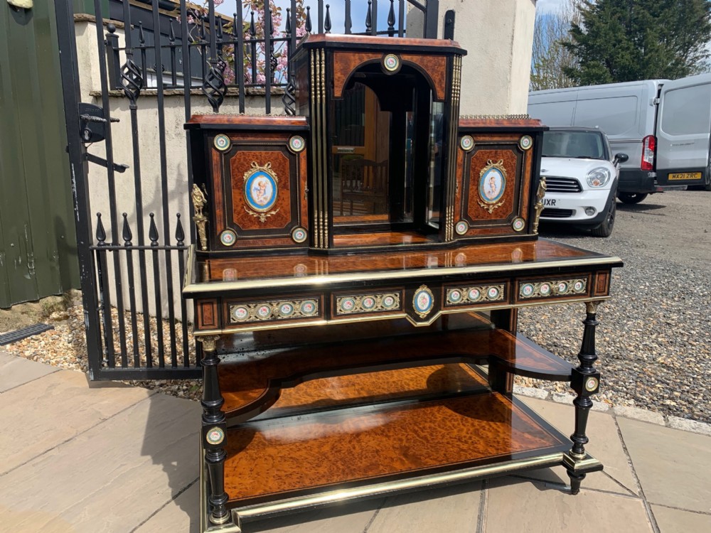 A stunning quality amboyna, ebony and ormolu mounted bonheur de jour