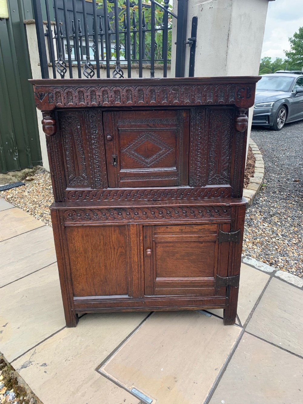 A small 17th Century antique oak court cupboard