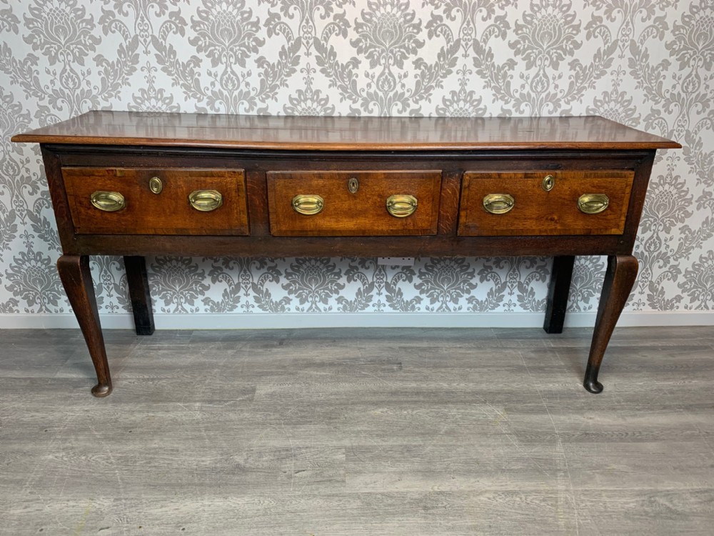 An English 18th Century antique oak dresser base
