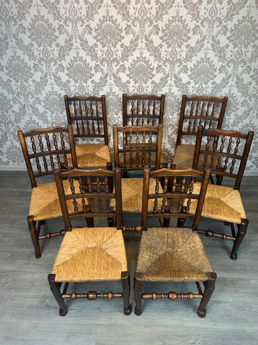 A Set of 8 Mid 19th Century Lancashire spindle back dining chairs