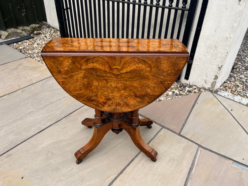 A Victorian Period burr walnut and walnut Sutherland table