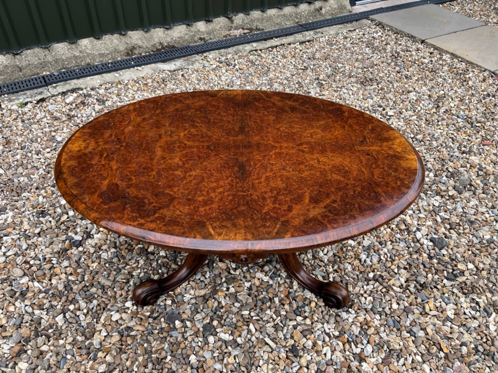 A fine quality Victorian Period burr walnut oval antique coffee table