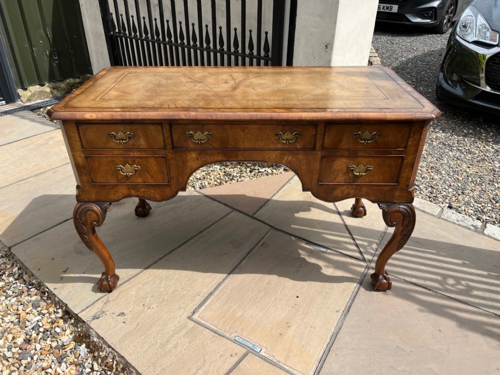A George I Style burr walnut desk.