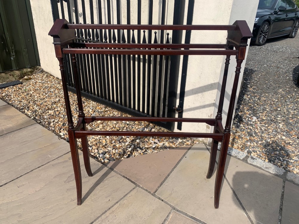 A fine quality Edwardian Period architectural mahogany inlaid towel rail