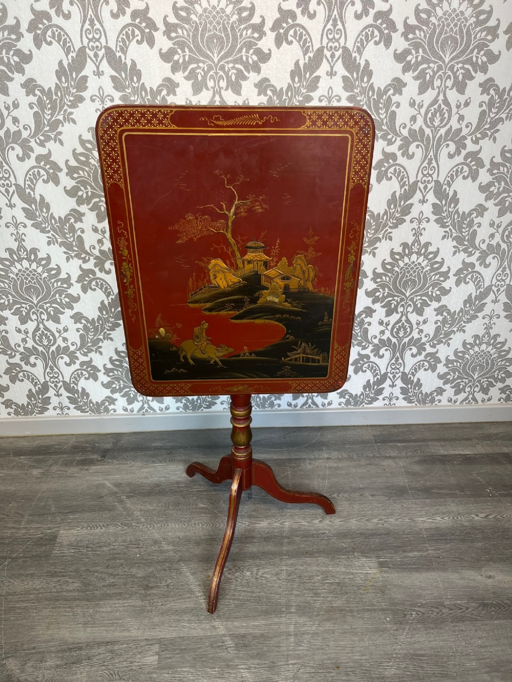 A Regency Style chinoiserie tripod table