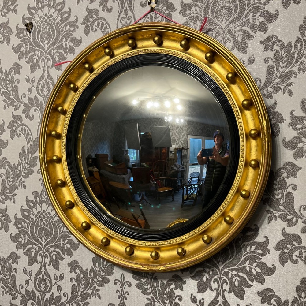 A 19th Century antique circular convex mirror 