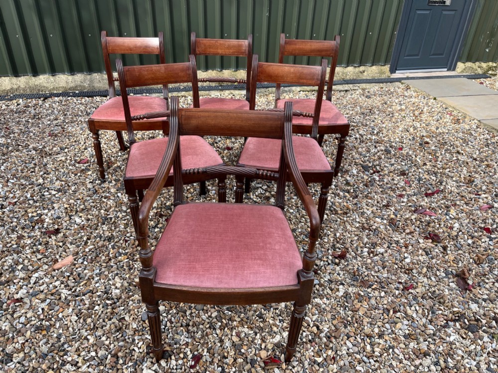 A Good set of six Regency Period mahogany dining chairs including one carver chair