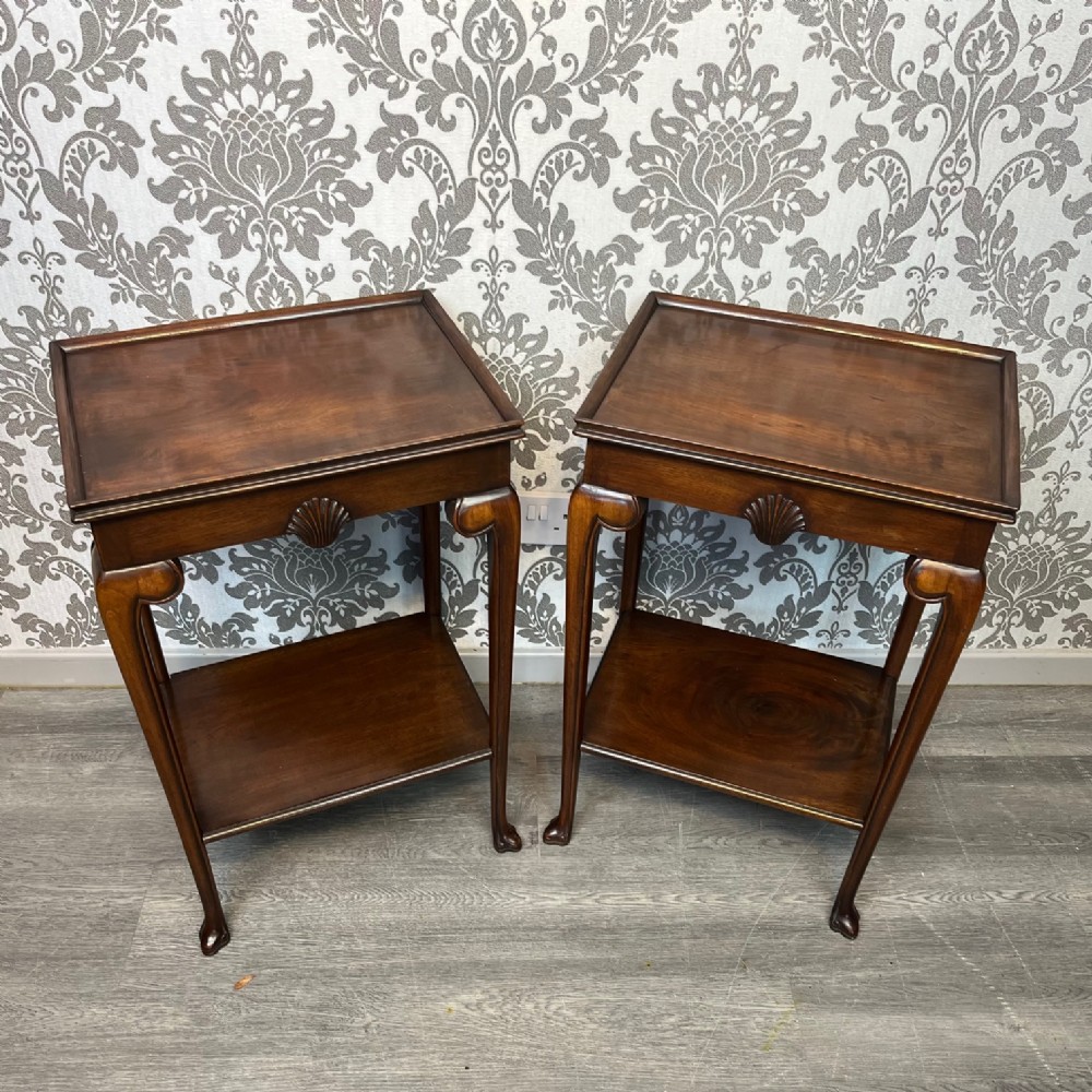 A lovely pair of George I Style mahogany lamp tables