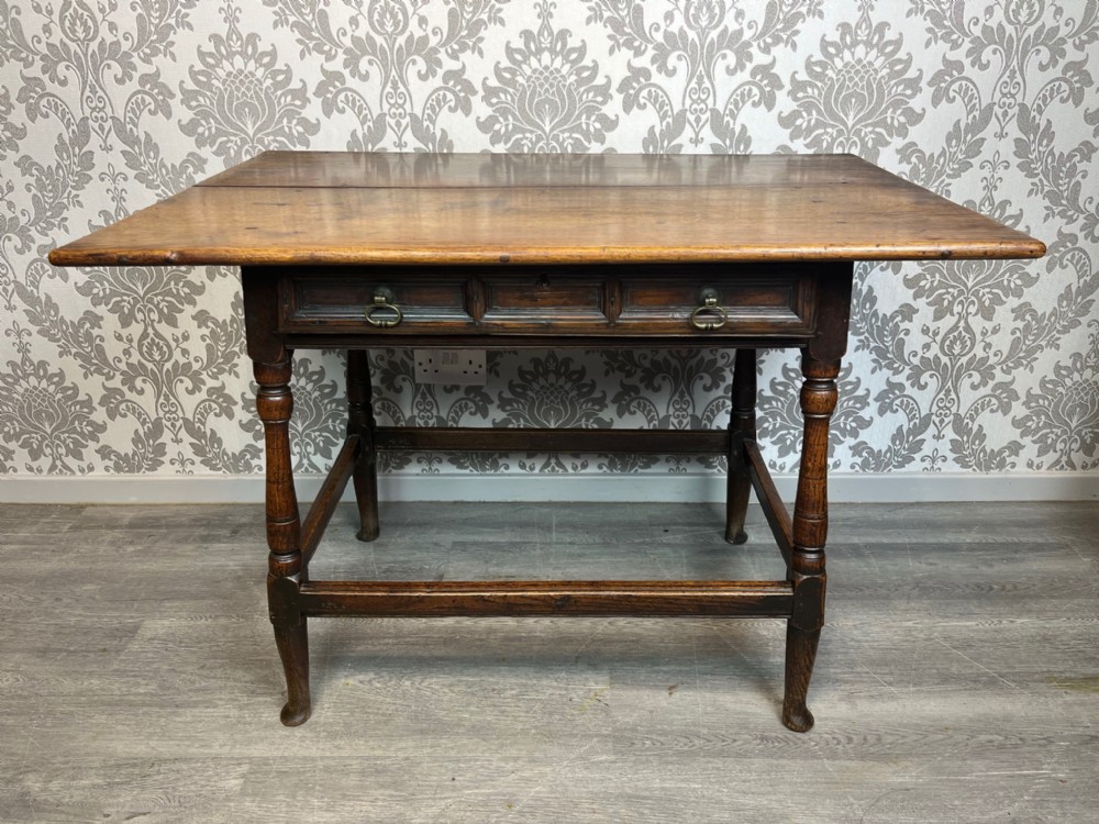 A lovely early 18th century oak side table