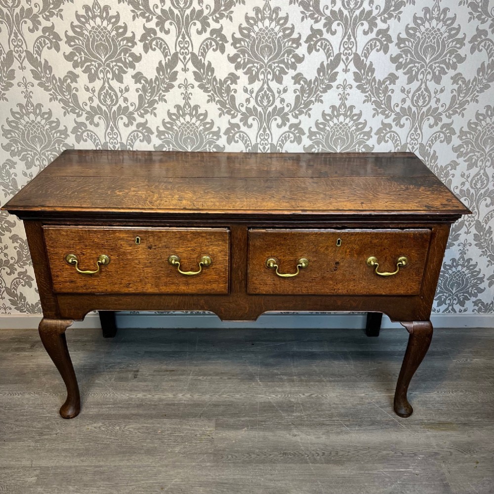 A George III period two drawer  antique oak dresser base