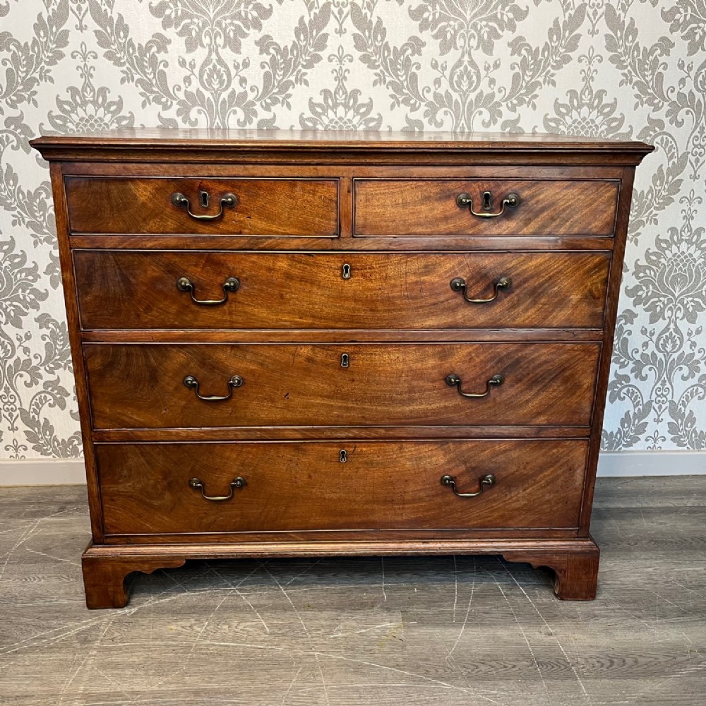A George III Period mahogany antique chest of drawers.