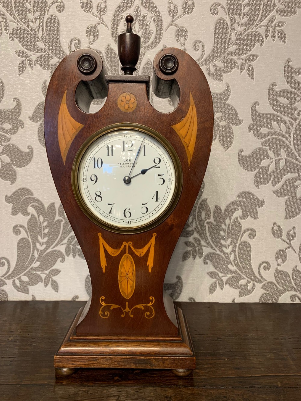 A fine quality Edwardian Period mahogany inlaid balloon mantle clock