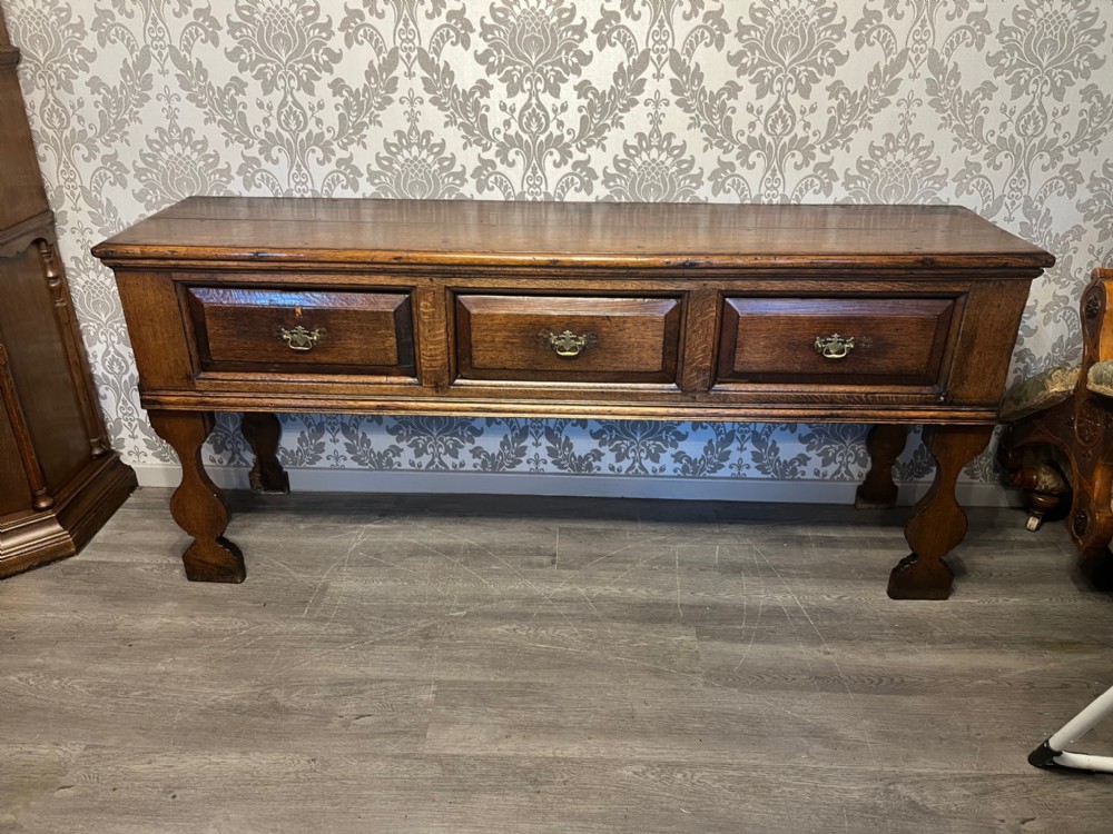 A good mid 18th Century oak antique dresser base