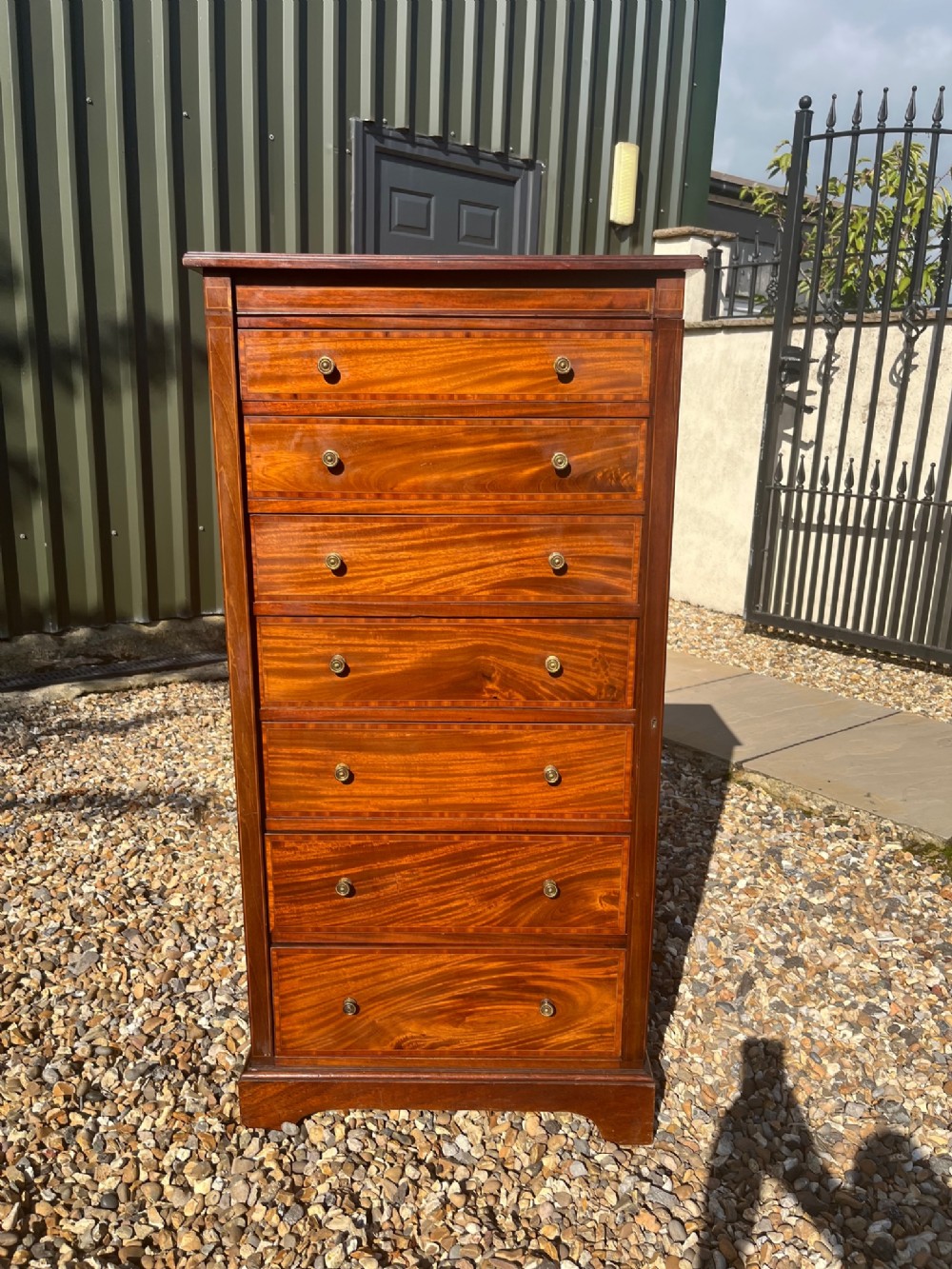 A fine quality Edwardian Period mahogany inlaid Wellington chest by James Shoolbred of London