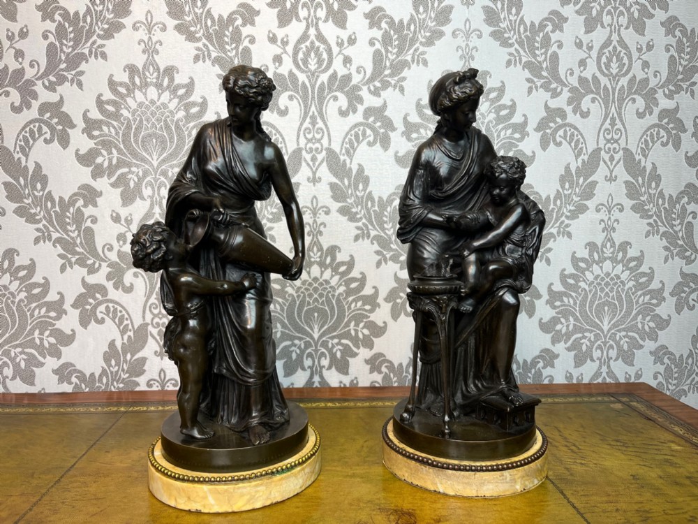 A fine quality pair of bronze figures depicting fire and water by by Louis Sauvageau 