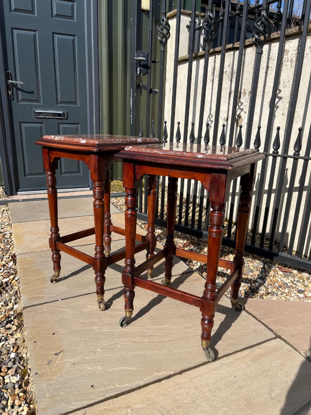 A pair of Victorian Period marble top stands