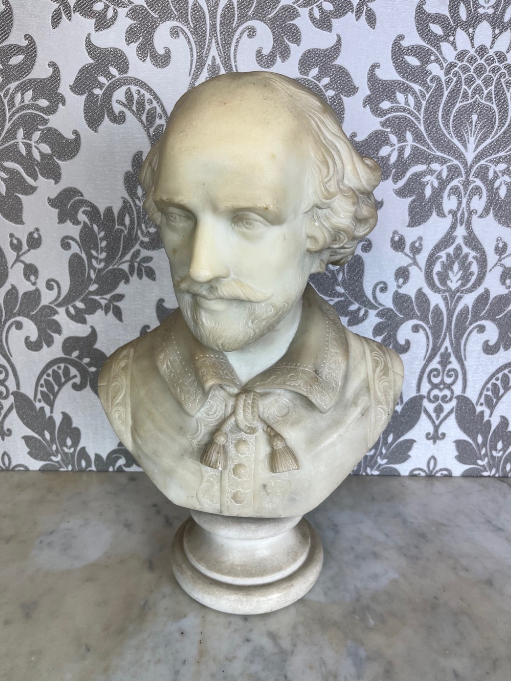 A finely carved 19th Century marble bust of William Shakespeare