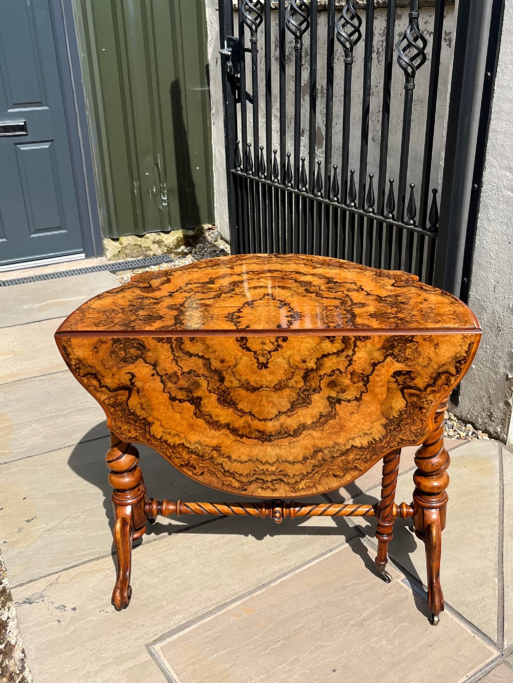 A Beautiful Victorian Period burr walnut shaped Sutherland table