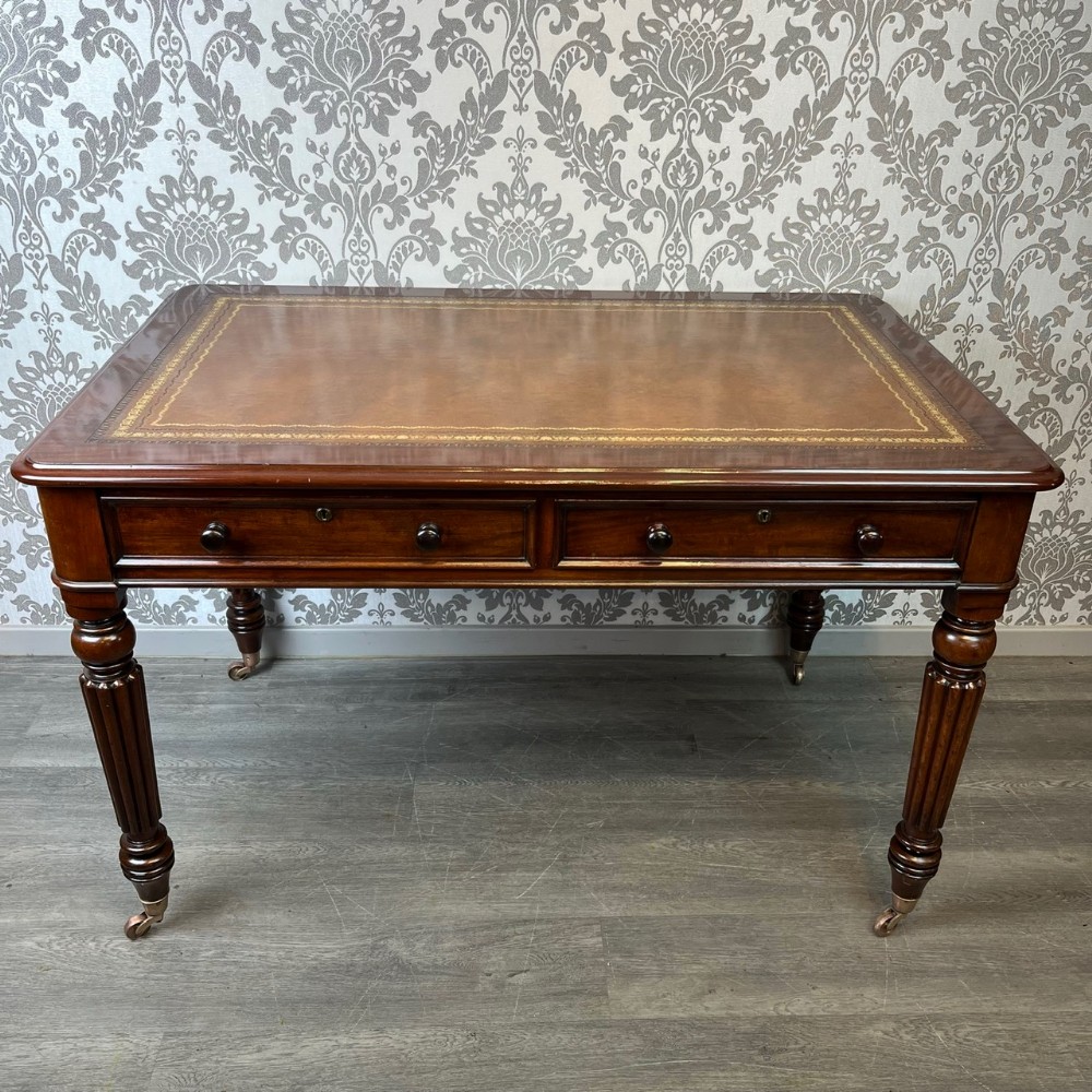 A Fine quality Early Victorian Period mahogany writing table by T. Wilson, Gt. Queens Street, London.