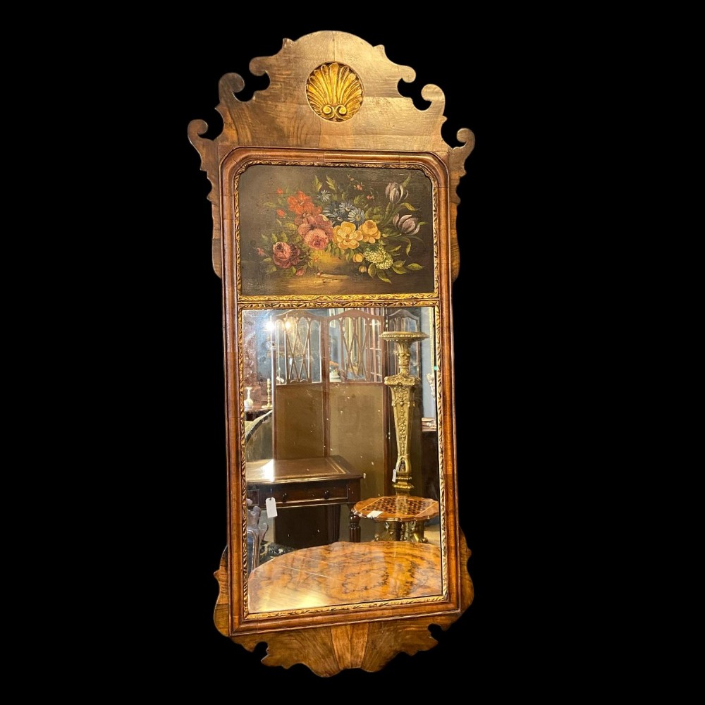 A Queen Anne Revival walnut wall mirror