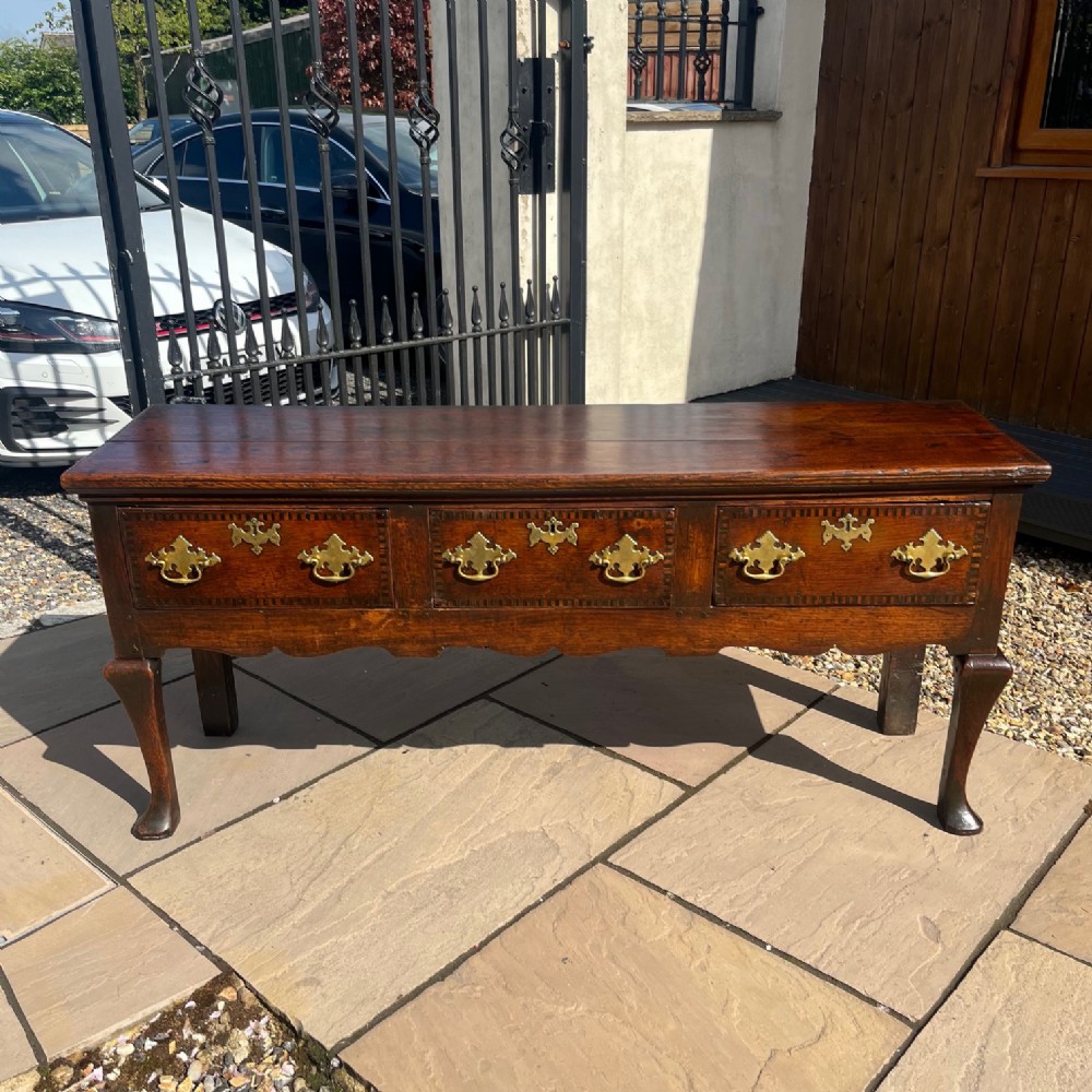 A good Georgian oak antique dresser base
