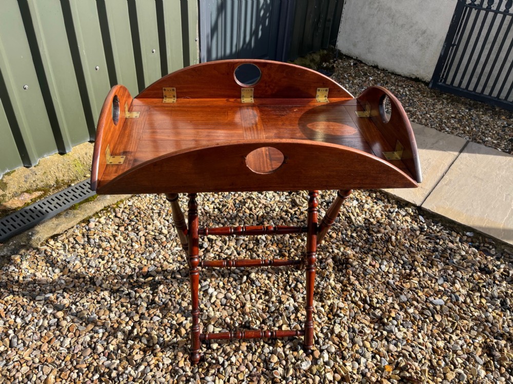 An Early 19th Century antique butlers tray on stand