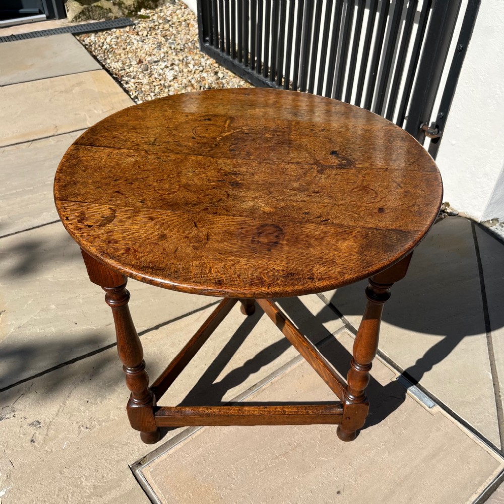 An 18th Century oak and ash cricket table
