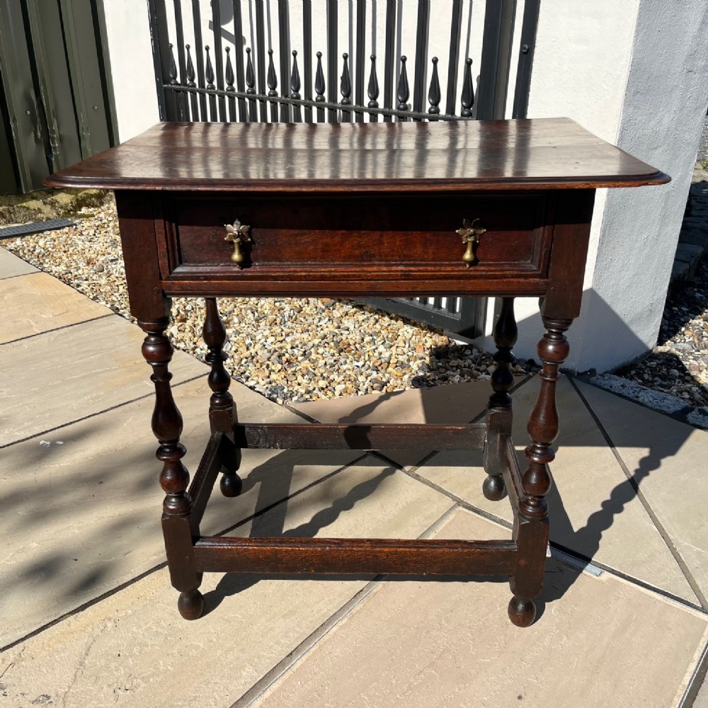 A 17th Century oak side table