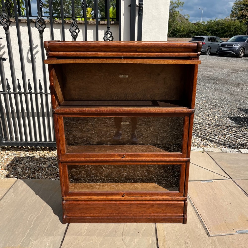 An oak Globe Wernicke stacking bookcase