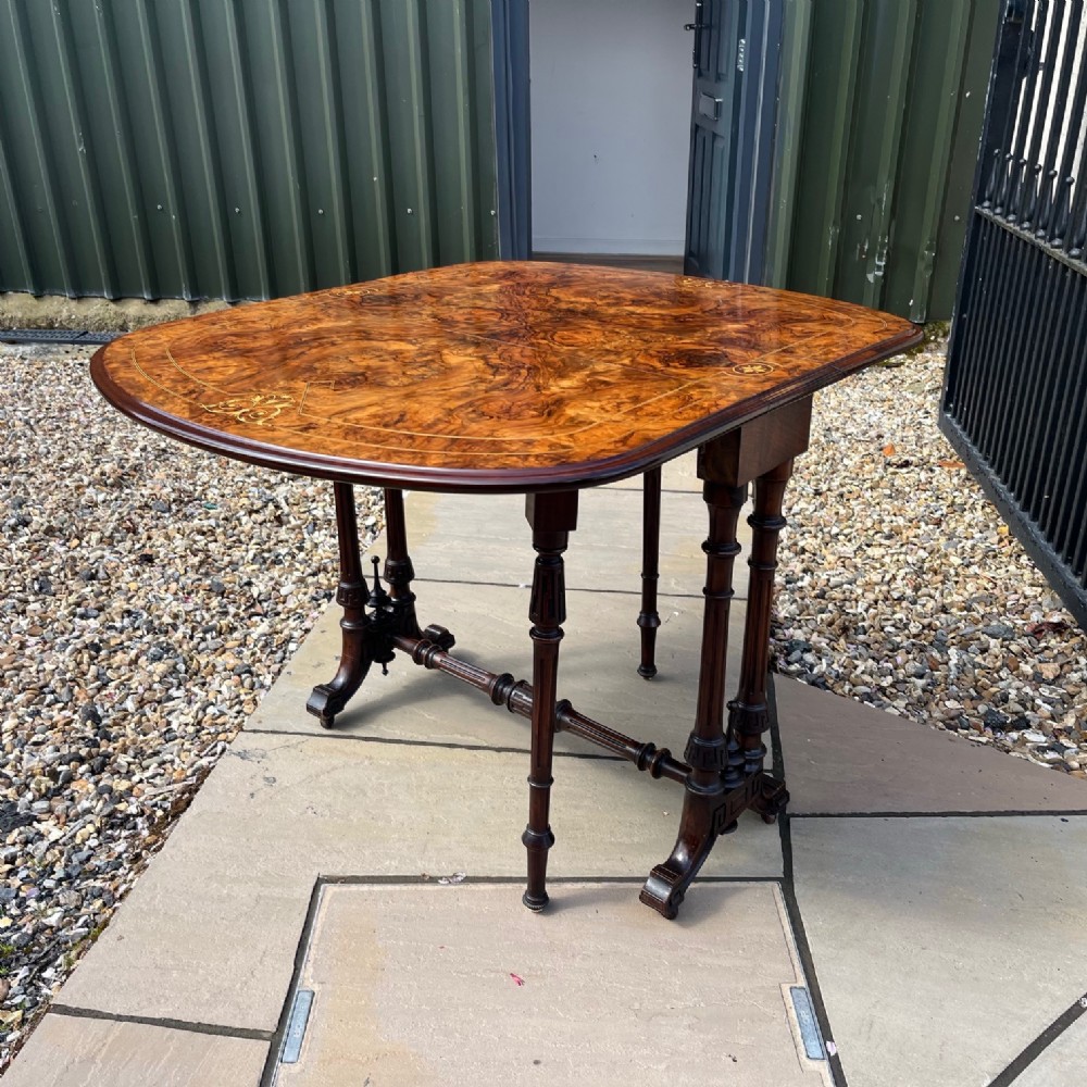 A fine quality Victorian Period burr walnut Sutherland table