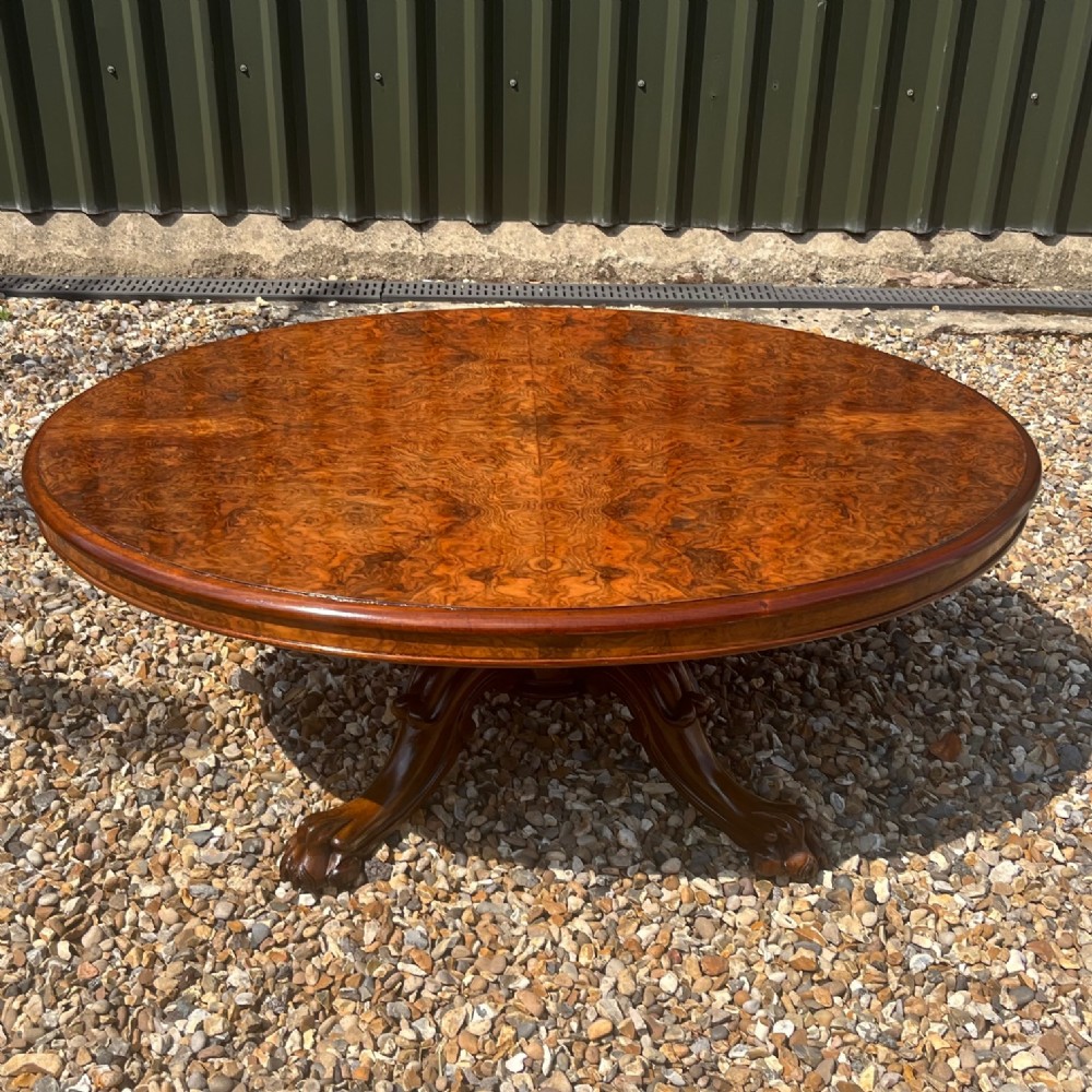 A beautiful large scale Victorian Period burr walnut oval coffee table