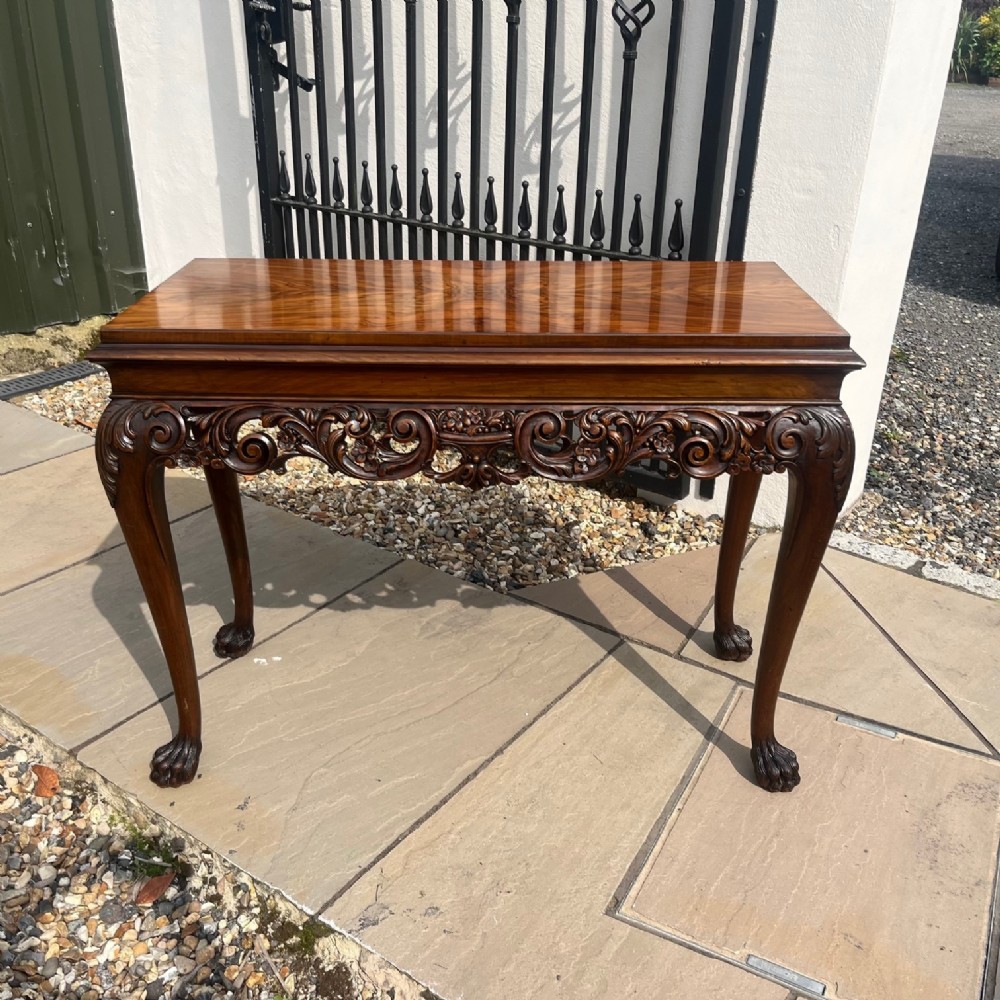 A Georgian Style walnut console table.