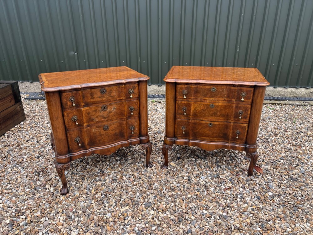A good pair of George I Style burr walnut serpentine chests