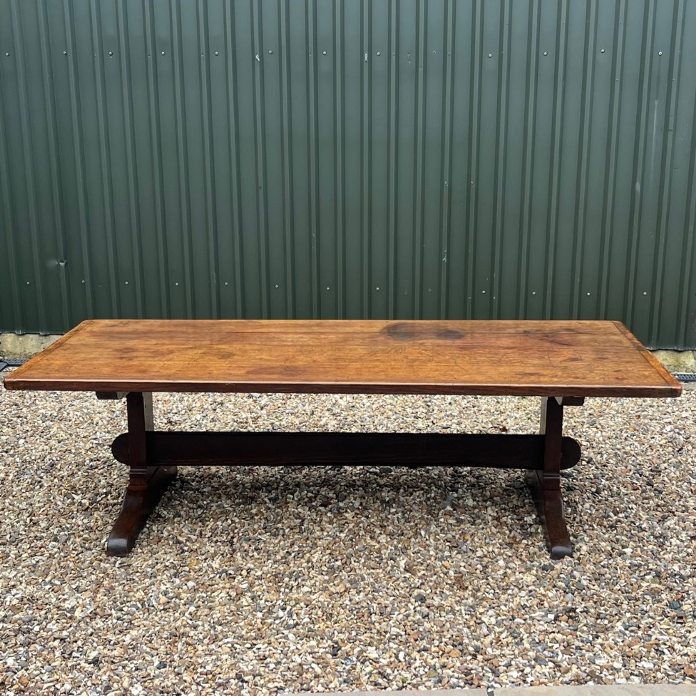 A large 18th Century Style 12-14 seater oak farmhouse table