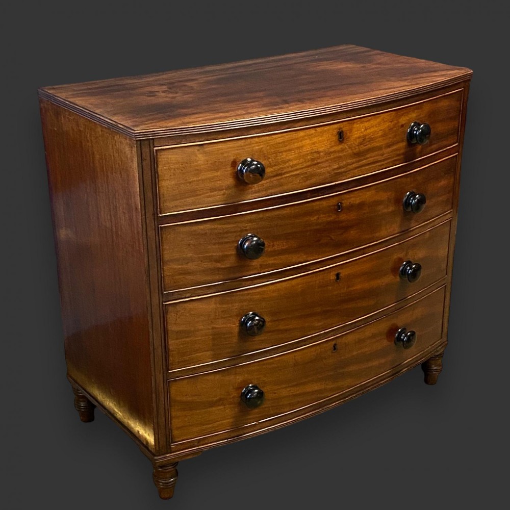 A Regency Period mahogany bow front chest of drawers