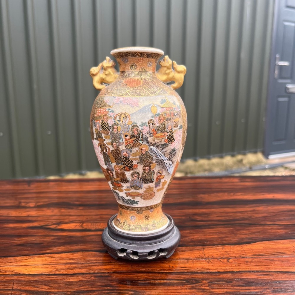 A Japanese Meiji period Satsuma vase on stand