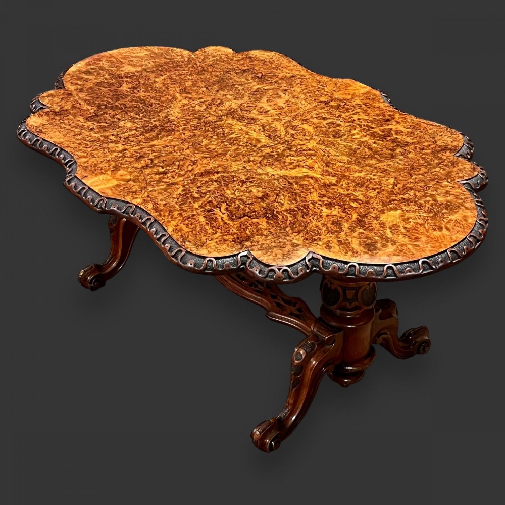 A beautiful Victorian Period burr walnut shaped coffee table