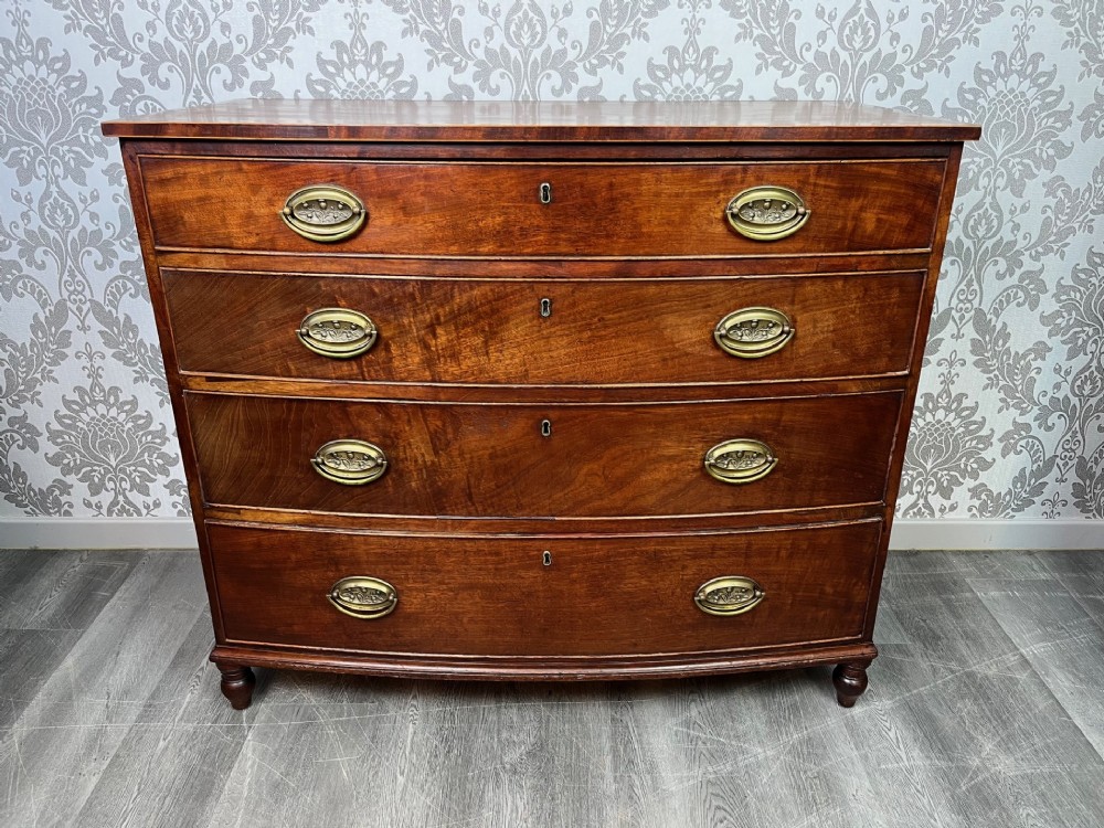 A Regency Period mahogany bow front chest of Drawers.