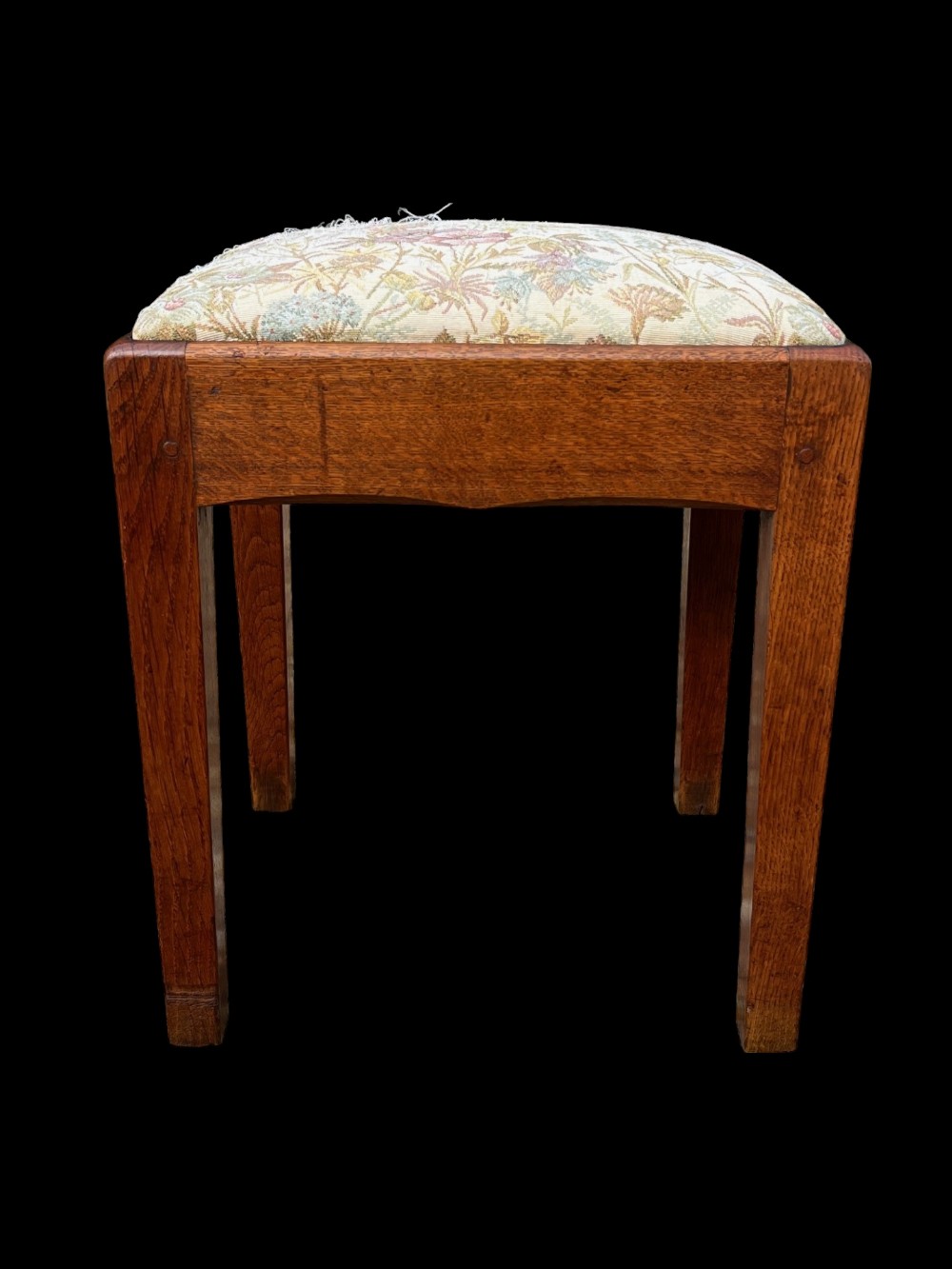 A charming Arts and Crafts Period Cotswold school oak stool