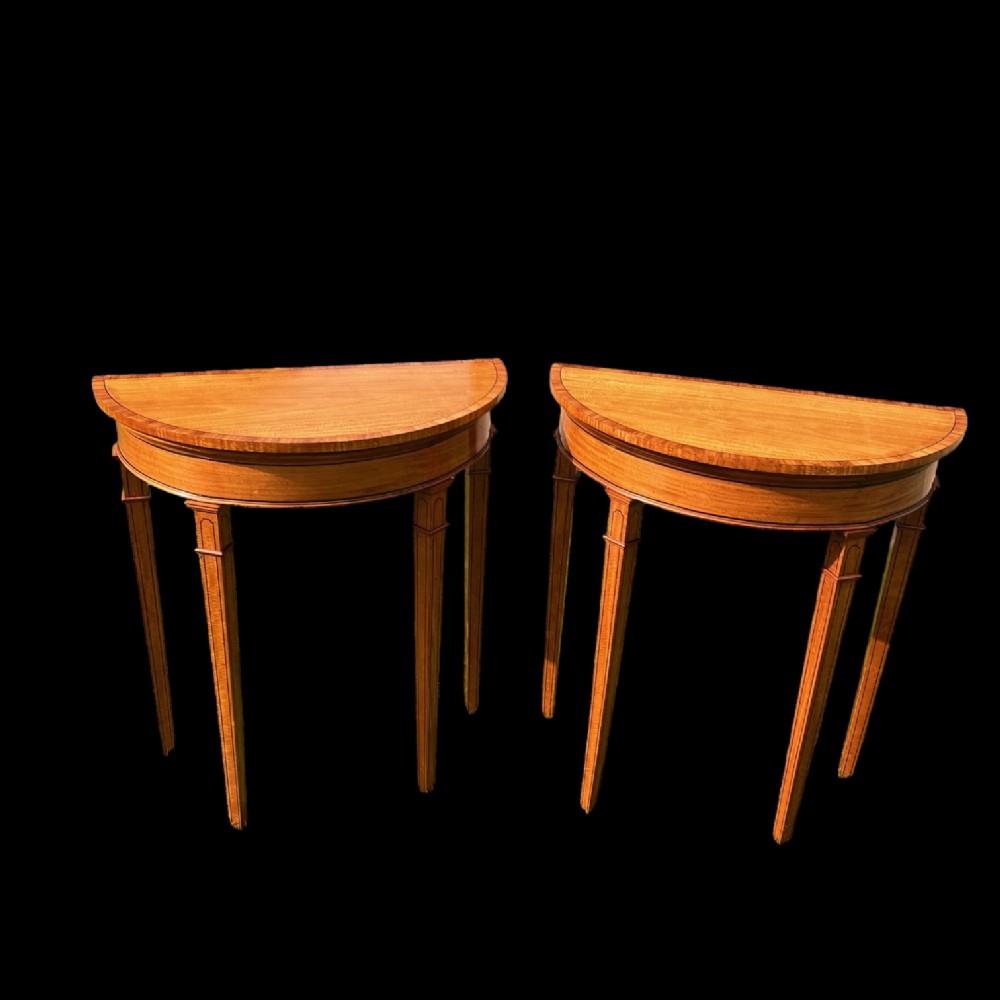 A lovely pair of Edwardian Period satinwood demi lune side tables