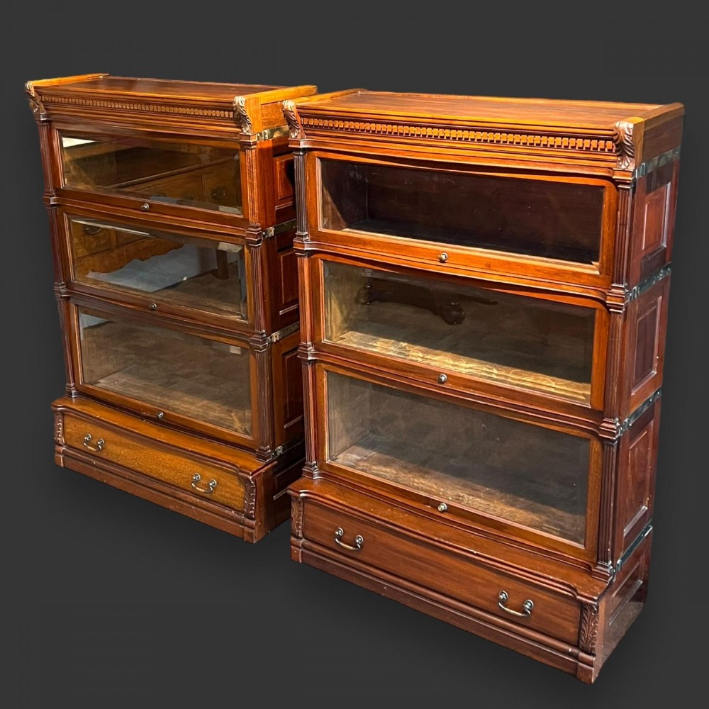 A Superb quality Pair of Mahogany Globe Wernicke Bookcases