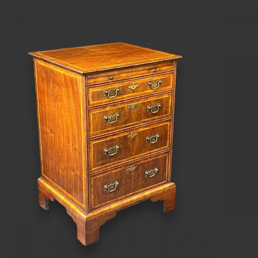 A George 1 Style walnut bachelors chest.
