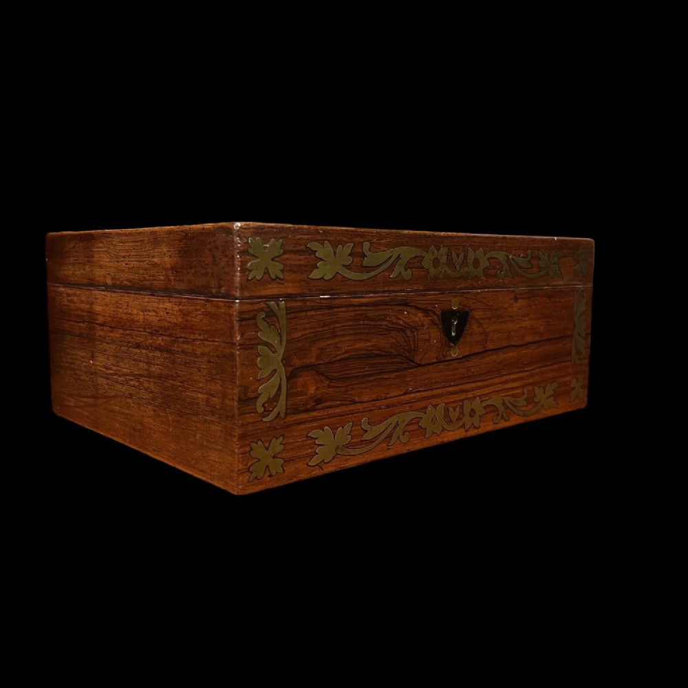 A lovely Regency Period rosewood and brass inlaid sewing box