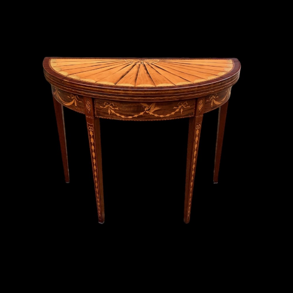 A George III Period Sheraton Demi lune fold over games table