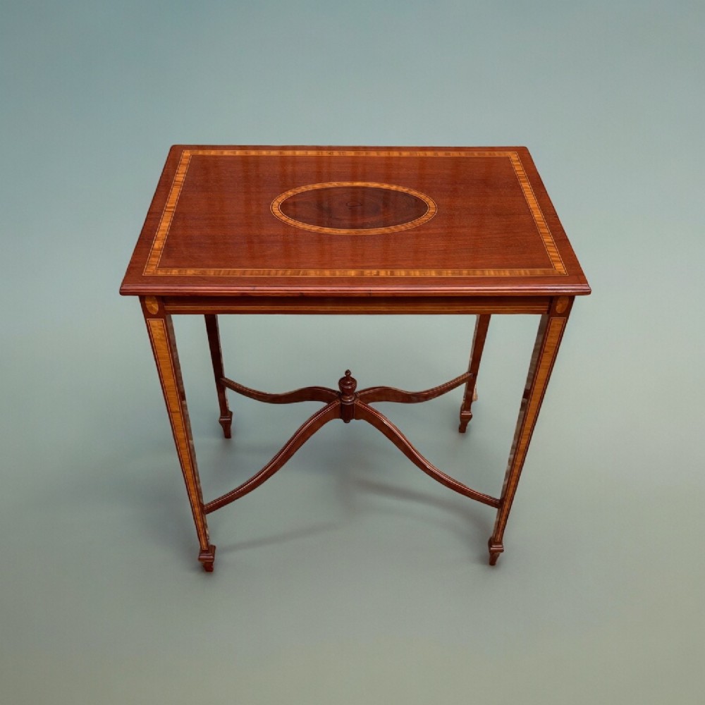 An Edwardian Period mahogany inlaid rectangular occasional table