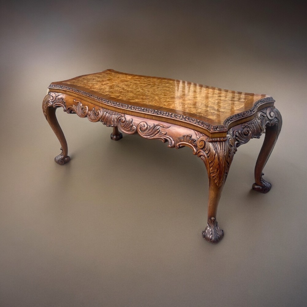A fine quality burr walnut and walnut coffee table