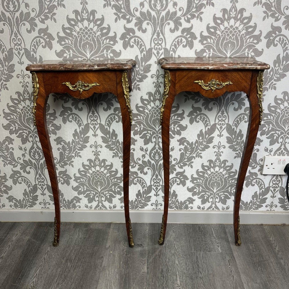 A pretty pair of small scale French rosewood console tables