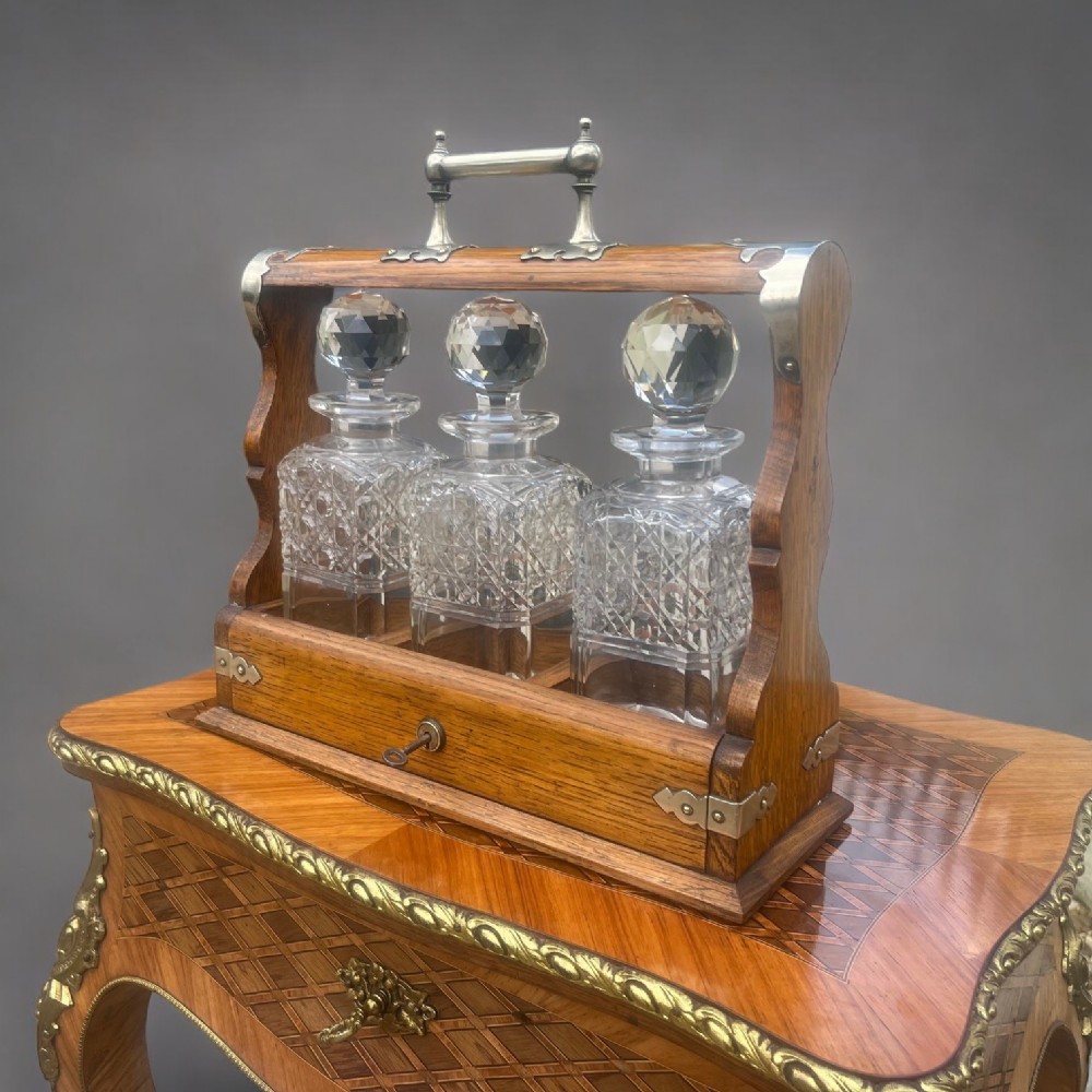 A Victorian Period oak tantalus