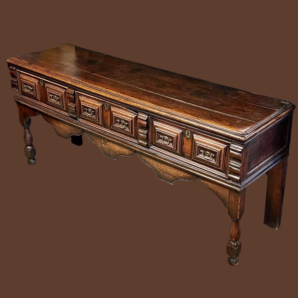 An early 18th Century oak dresser base.
