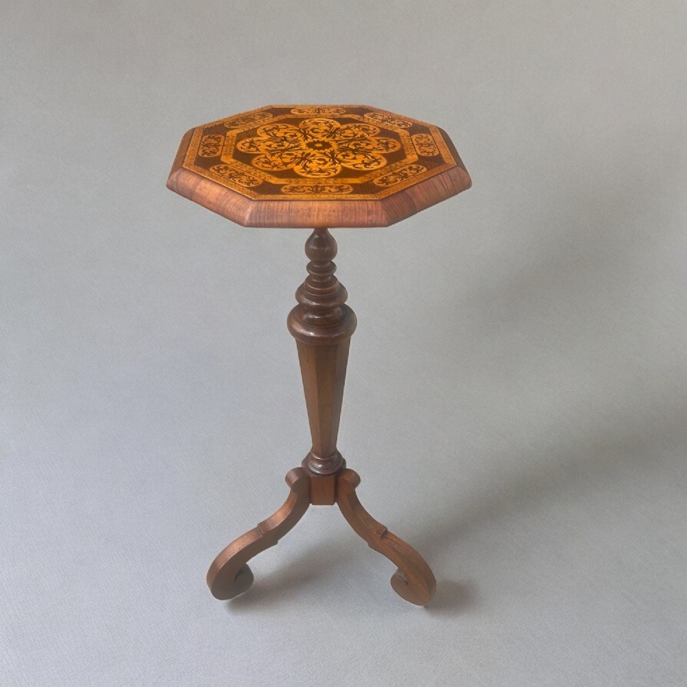 A William and Mary Style walnut and marquetry inlaid table.